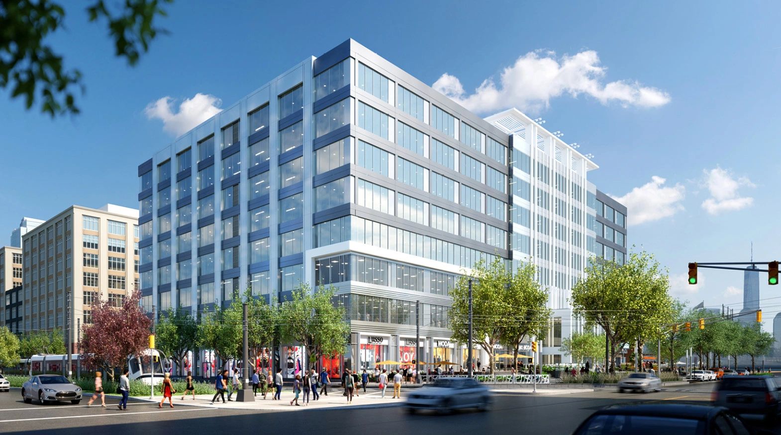 Modern mixed-use urban development with glass facade